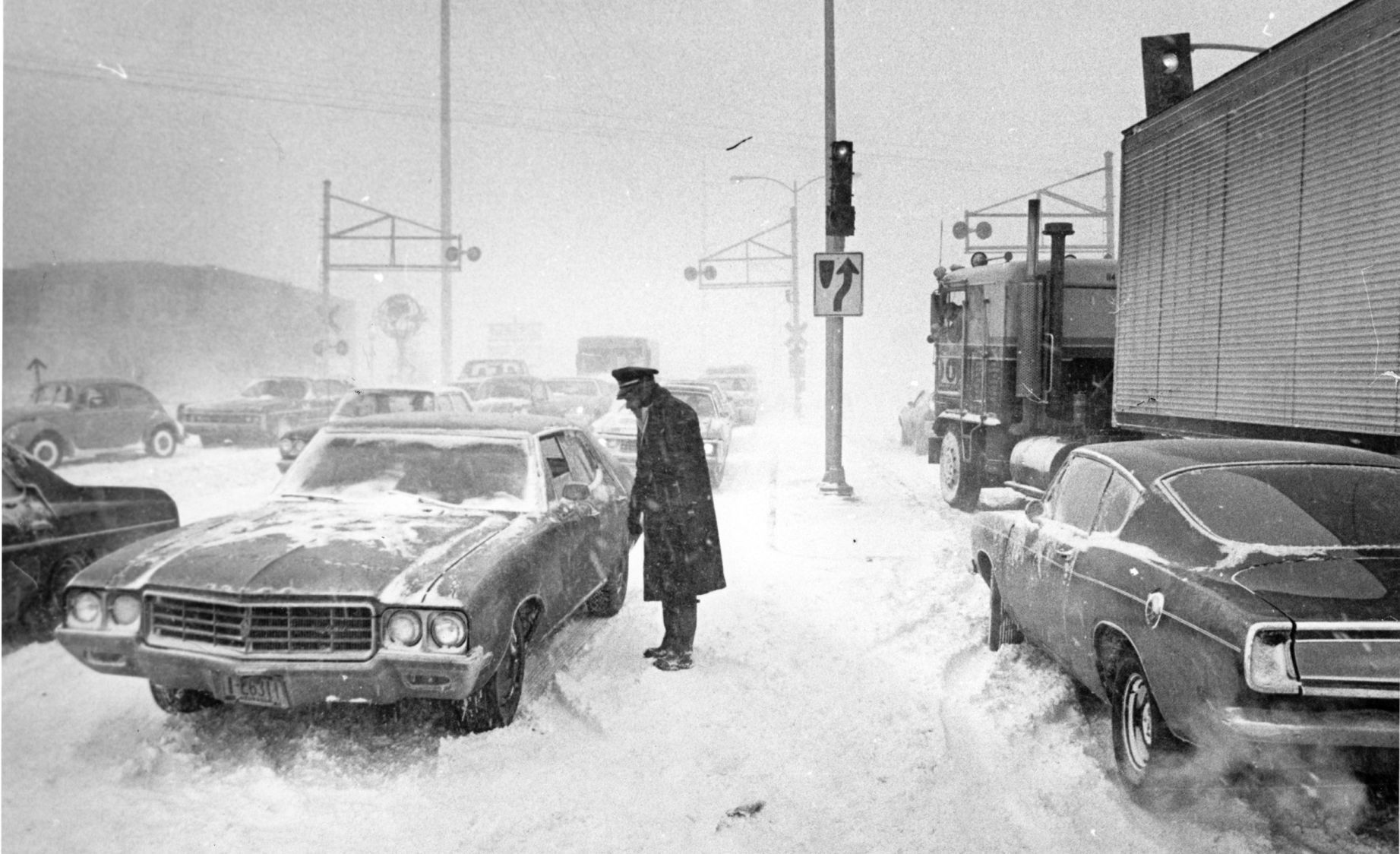 Cars got stuck at 72nd and Pacific Streets, and motorists stumbled through whiteout conditions in search of shelter during the storm on Jan. 10, 1975.